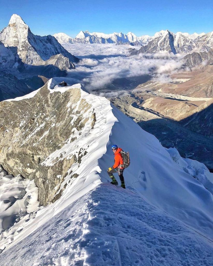 Ultimate Guide to Peak Climbing in Nepal: Top Peaks & Essential Tips 9 a person on a snowy island peak